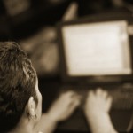 Woman Typing on Laptop Computer